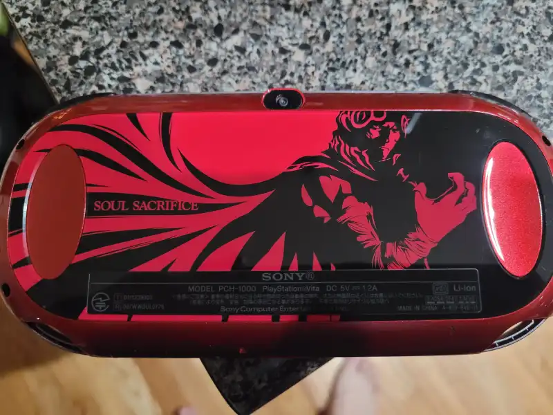 Sony PS Vita PCH-1000 Soul Sacrifice Console - Consolevariations